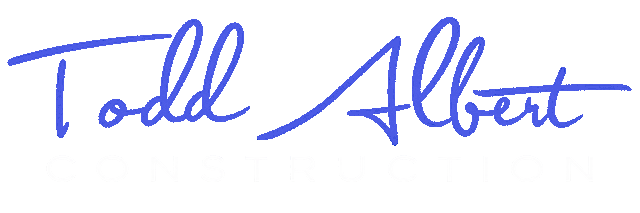 Todd Albert Construction logo with elegant blue script text on a transparent background.